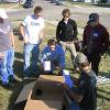 MET 480 "Alternative Energy Applications" class members assembling the tower bolt kit